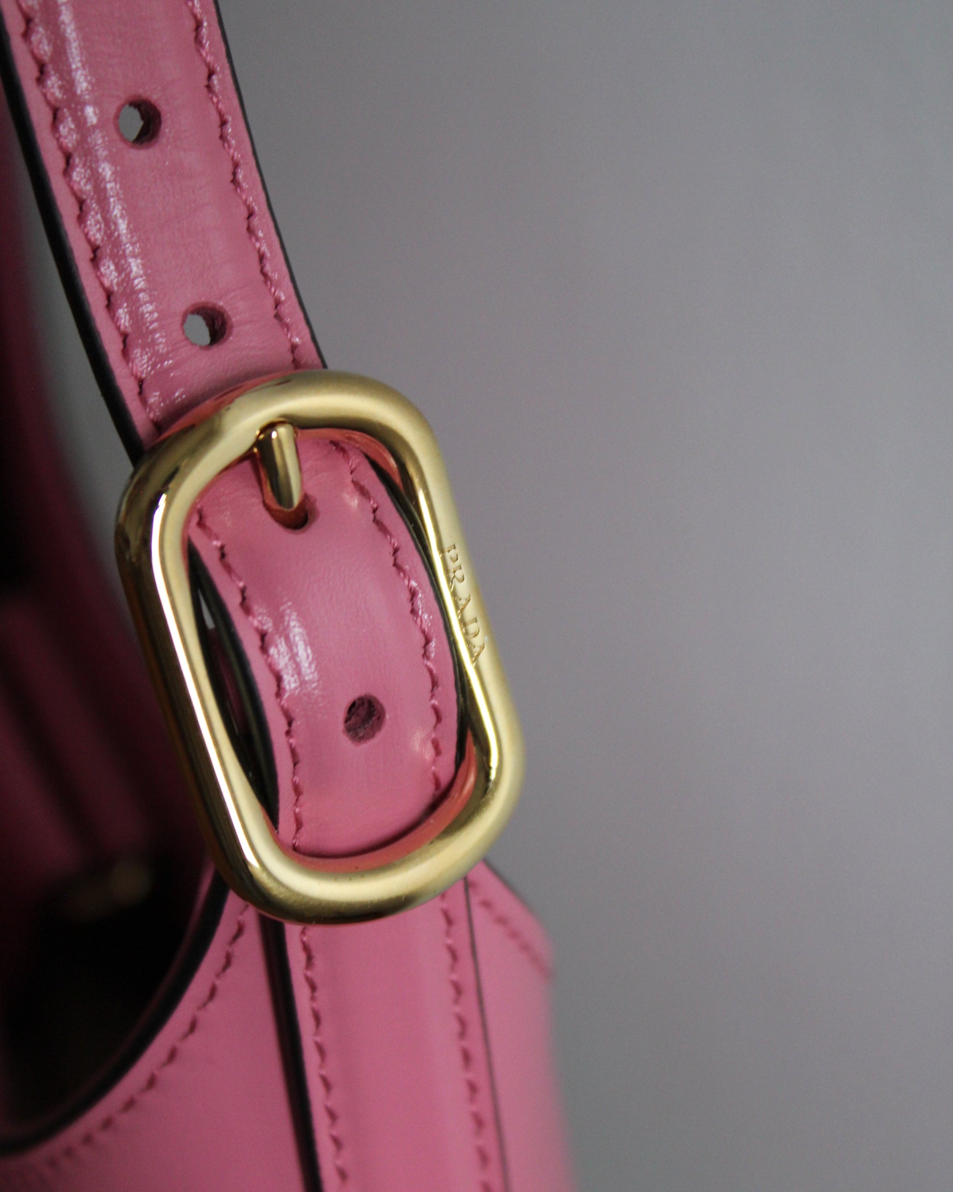 golden hardware on large pink cleo prada bag 1BC179