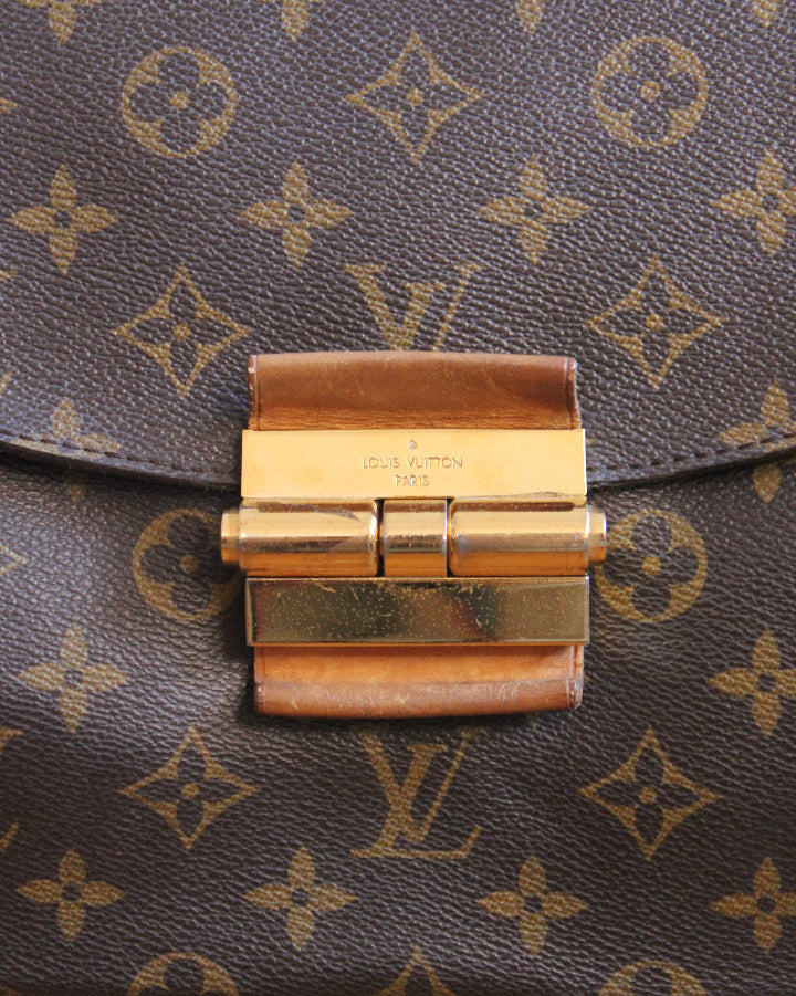 Louis Vuitton mongram olympe magnetic push clasp