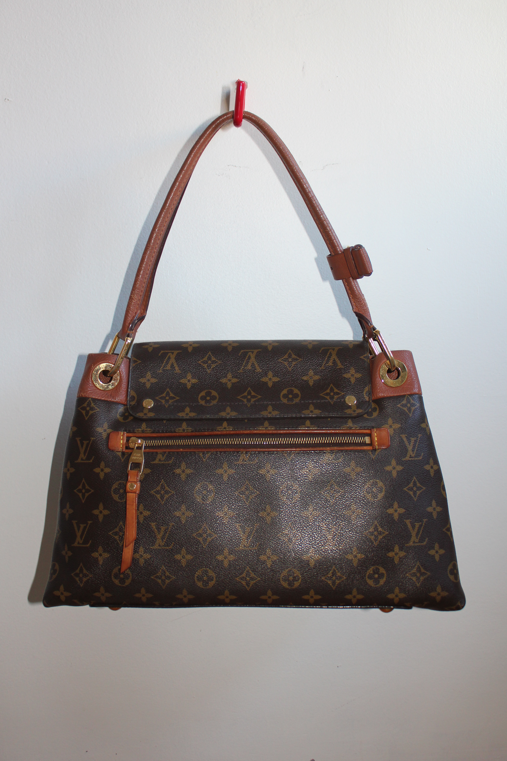 back zipper pocket vintage monogram Louis Vuitton Olympe bag from 2011