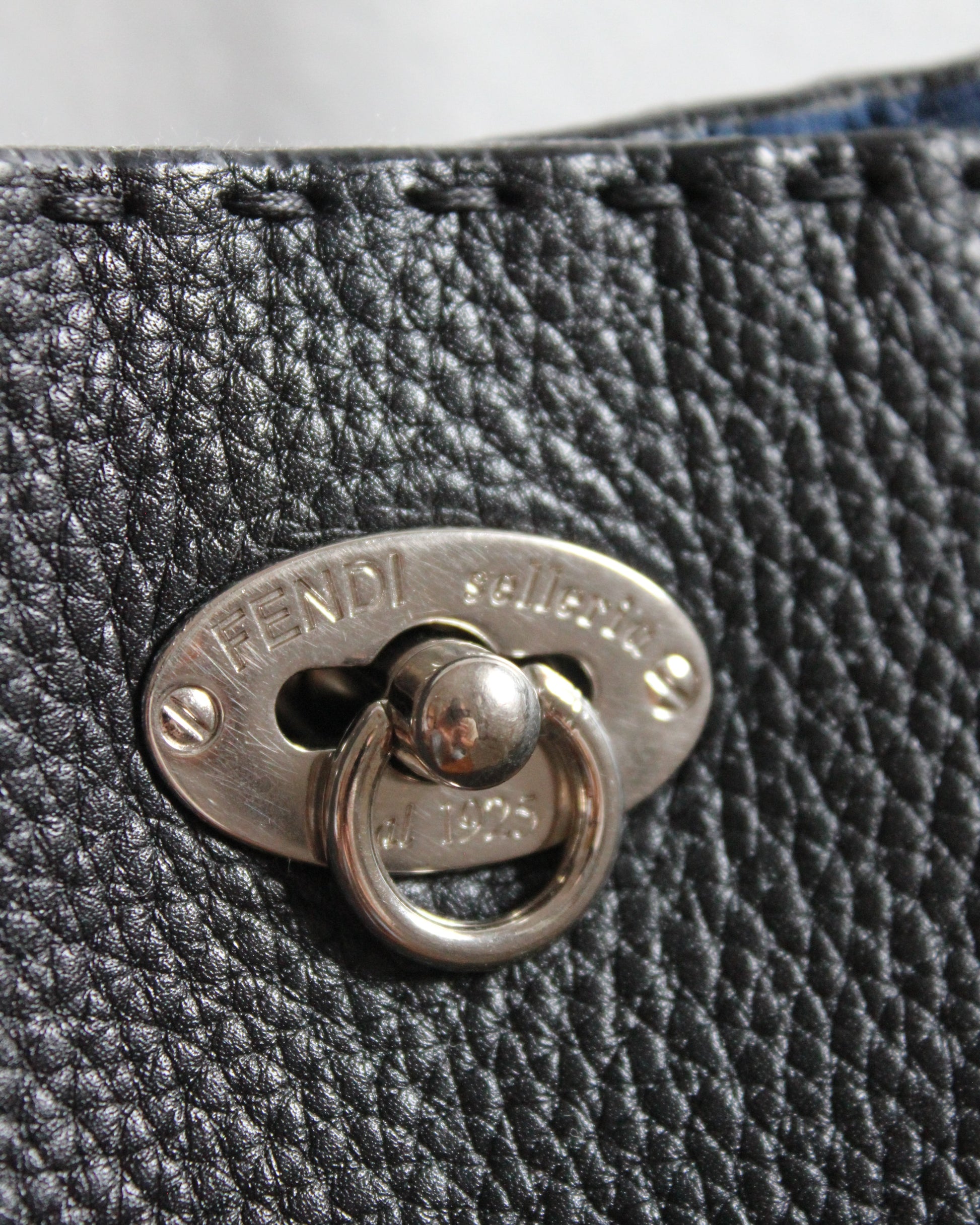 Fendi selleria black turn lock clasp