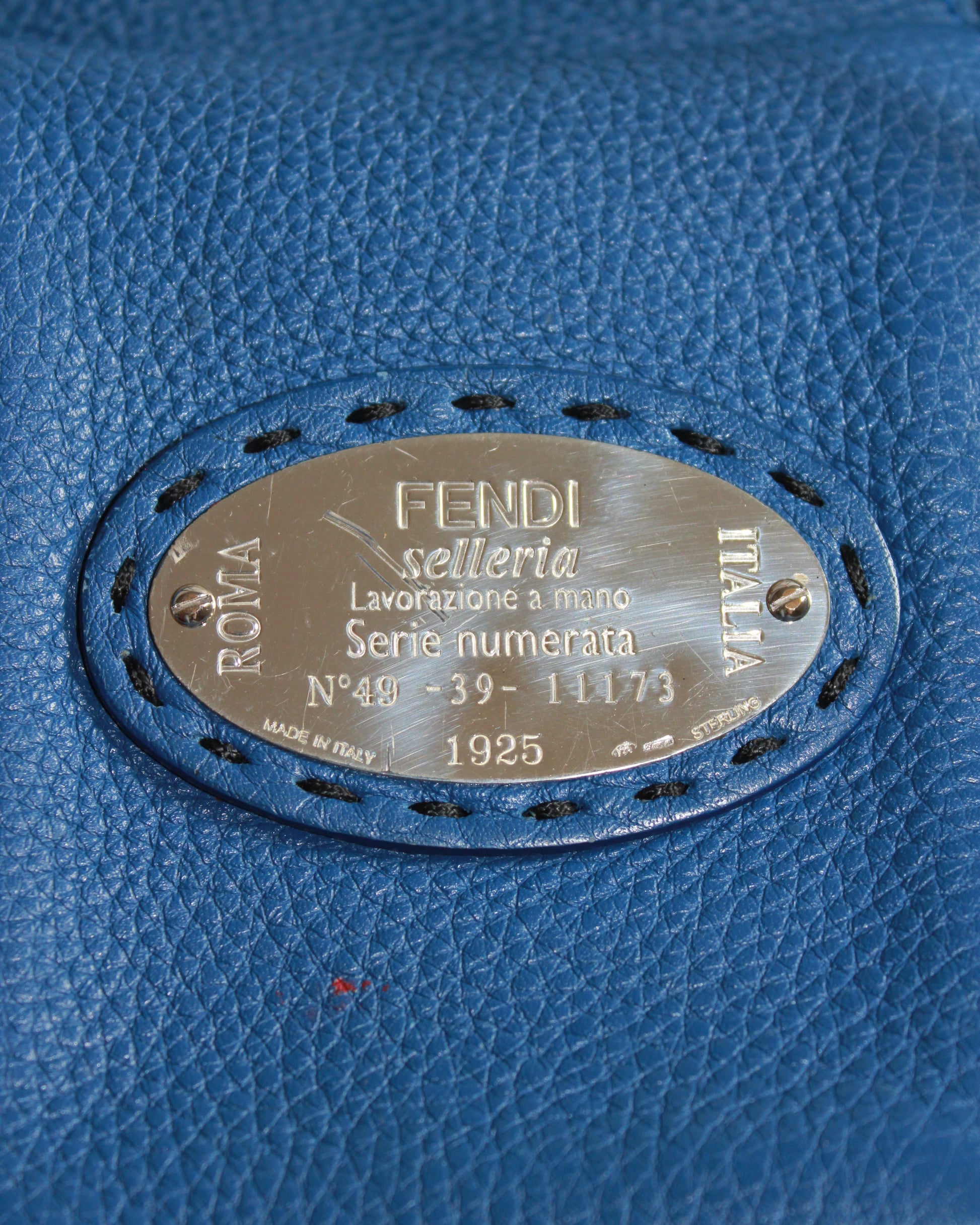 Fendi selleria plaque and red mark