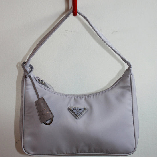 front of prada tessuto re-edition 2000s bag in wisteria