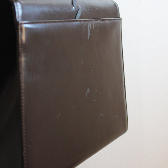 Scuffs on back of vintage YSL handbag